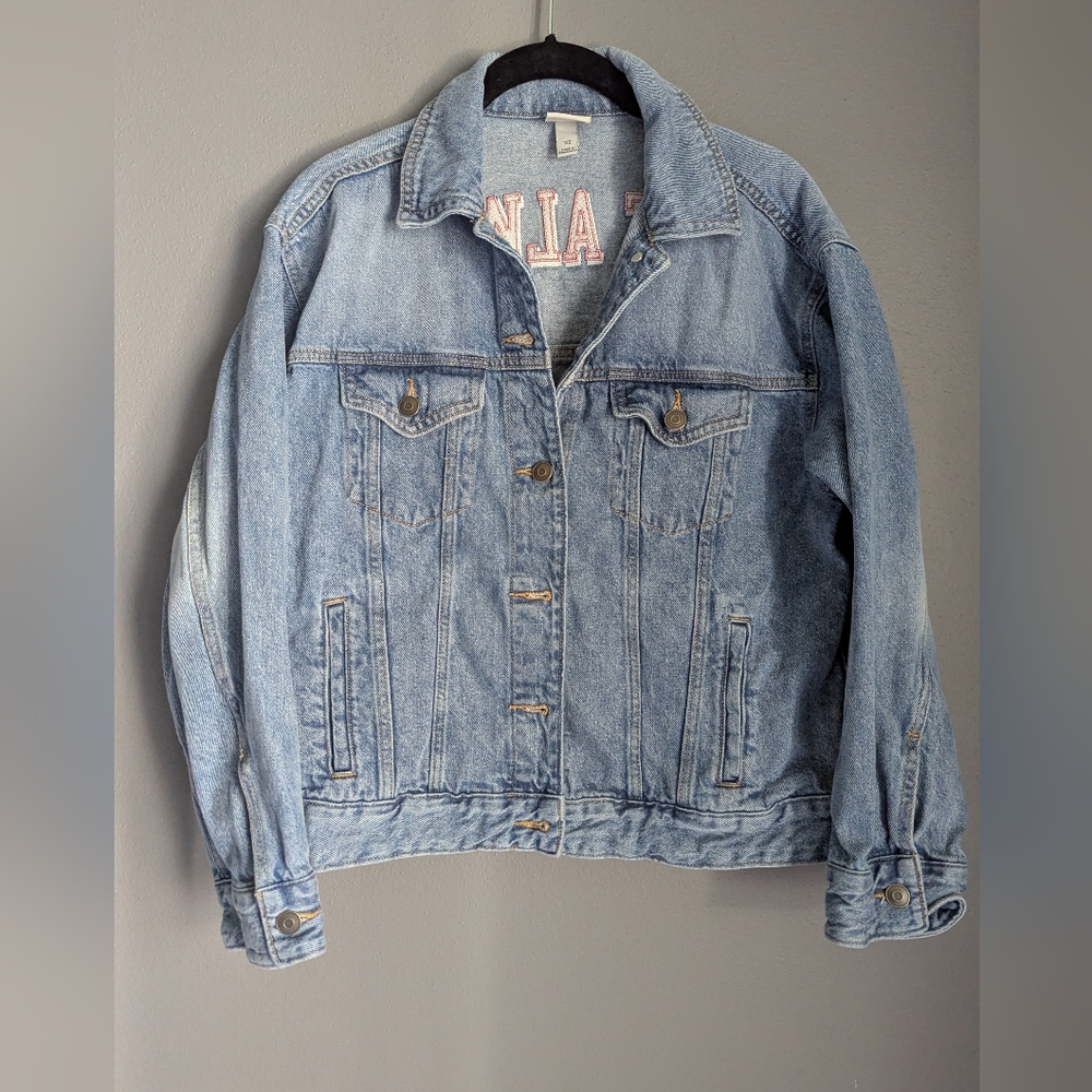 A new day denim jacket size XS With "love Always" Stitched On Back. 20x30 x22